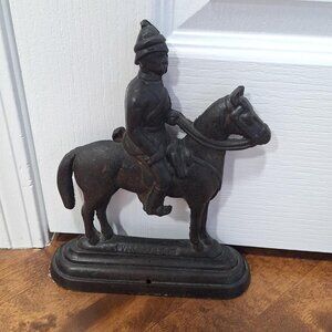 Vintage horse door stop cast iron soldier on horseback black military